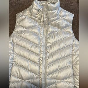 Used-Like new silver The North Face puffer vest.